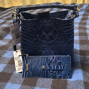 Bag and wallet never carried.  Still has tags attached